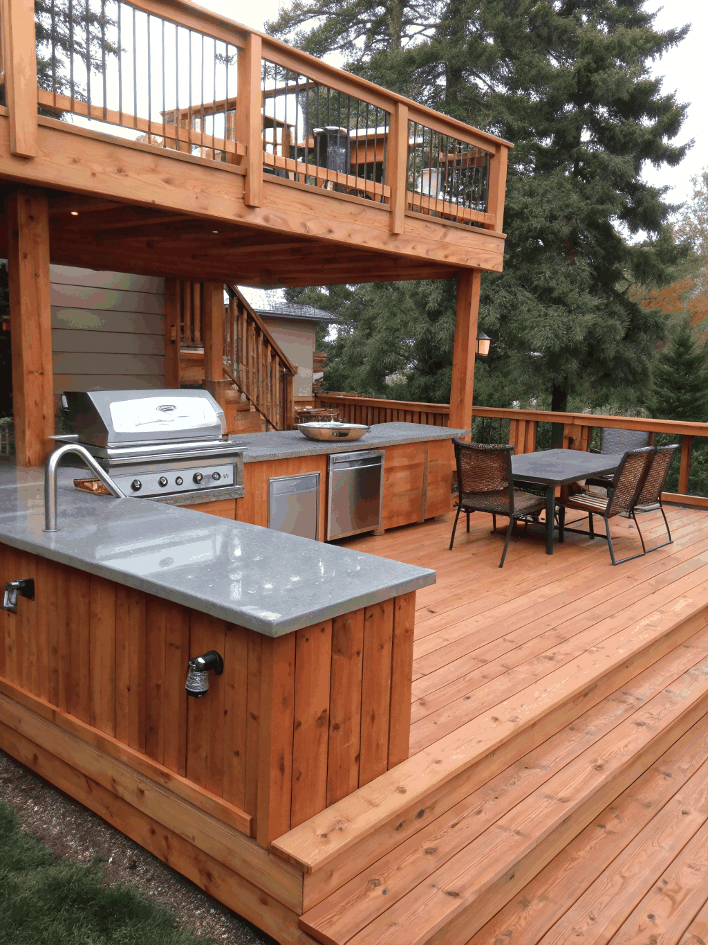 Custom cedar deck build with integrated seating and lighting